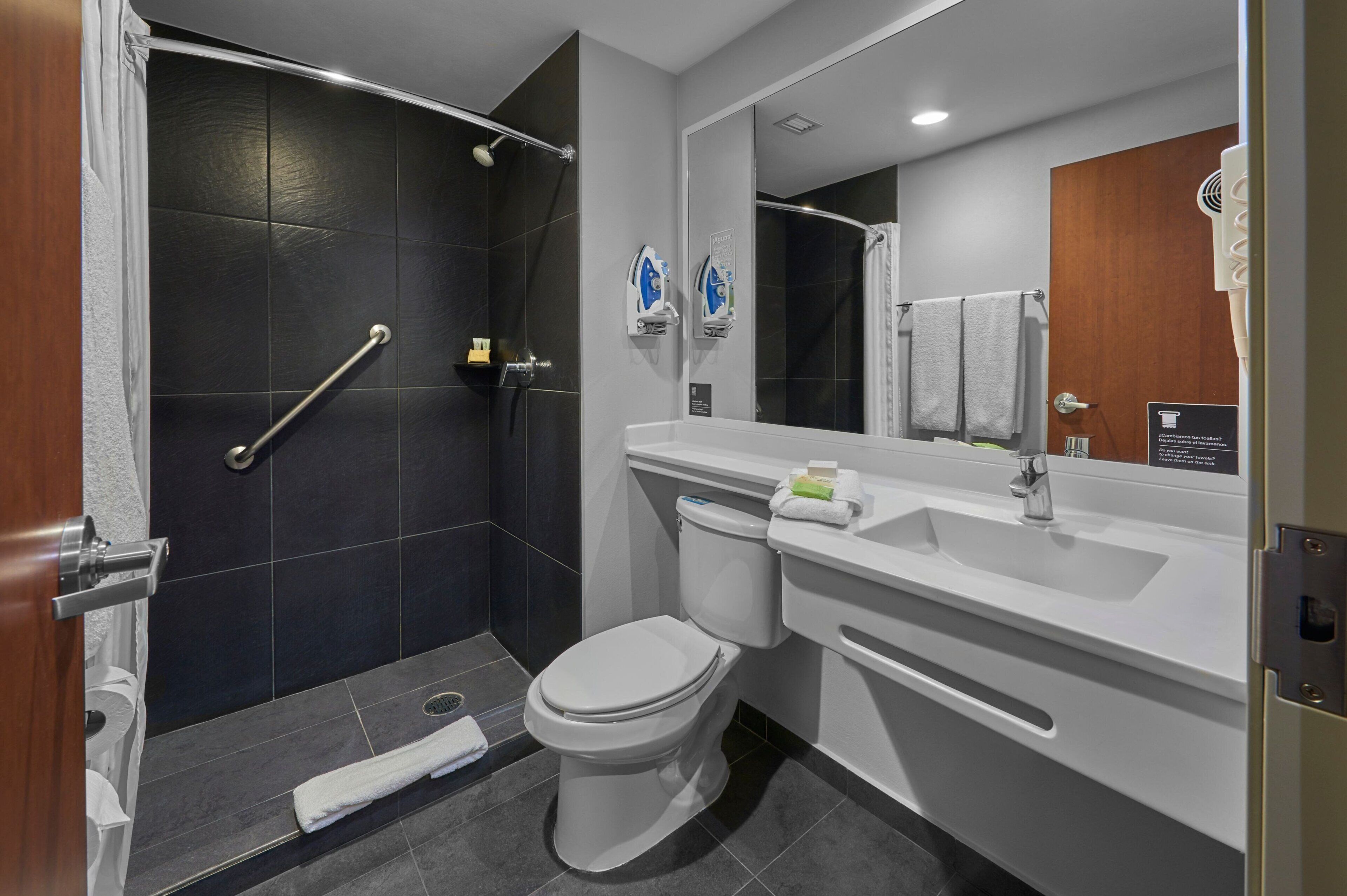 shower, free toiletries, hair dryer, towels