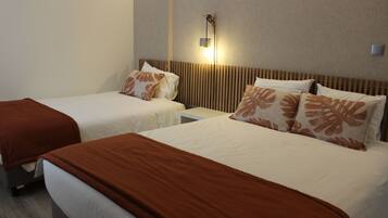 Triple Room | Desk, blackout curtains, free cots/infant beds, free WiFi