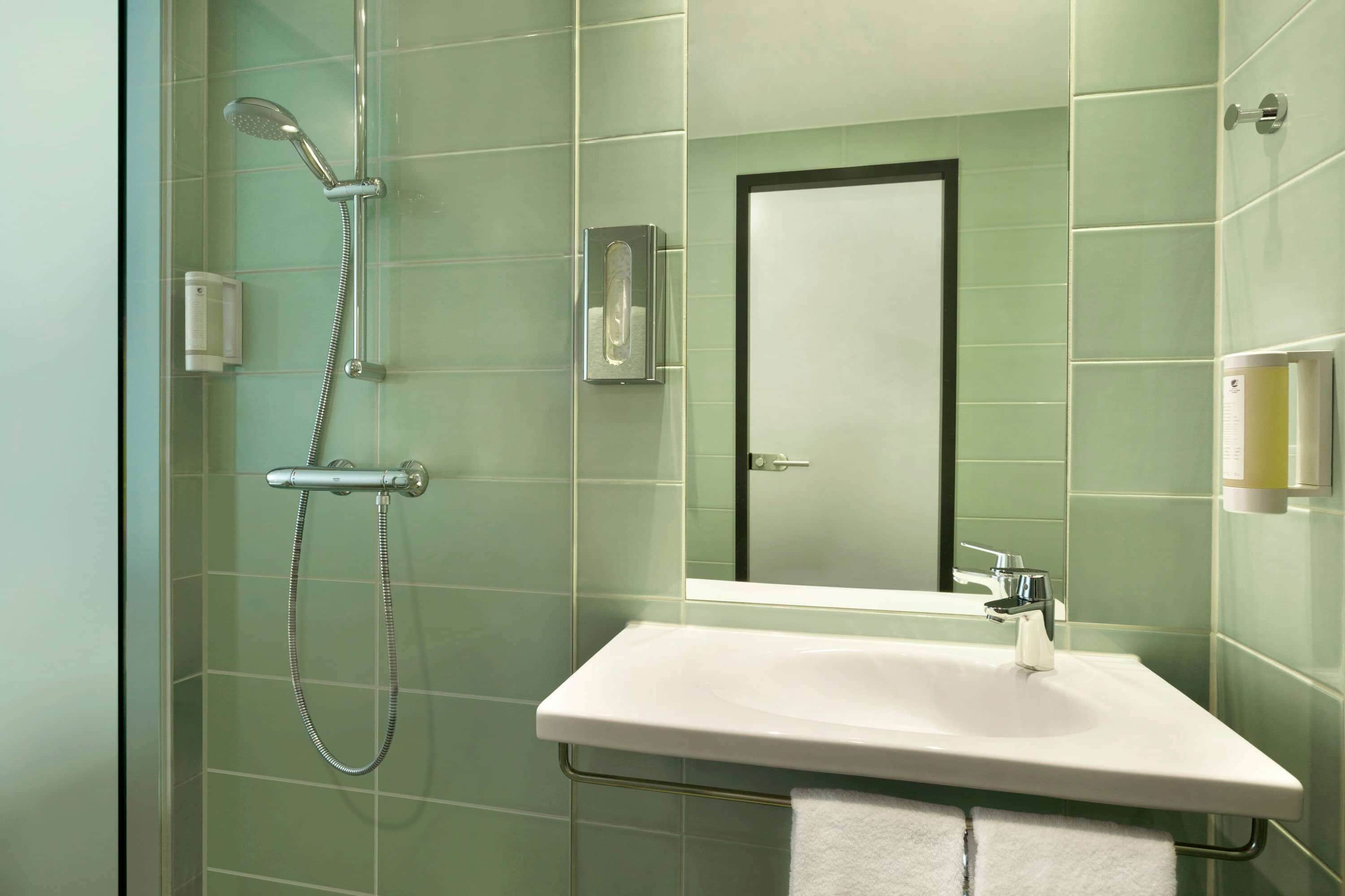 shower, hair dryer, heated floors, towels