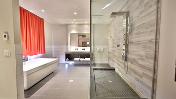 Shower, rainfall showerhead, hair dryer, towels