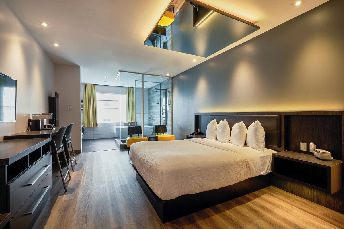 Suite, 1 Queen Bed | In-room safe, soundproofing, iron/ironing board (on request)