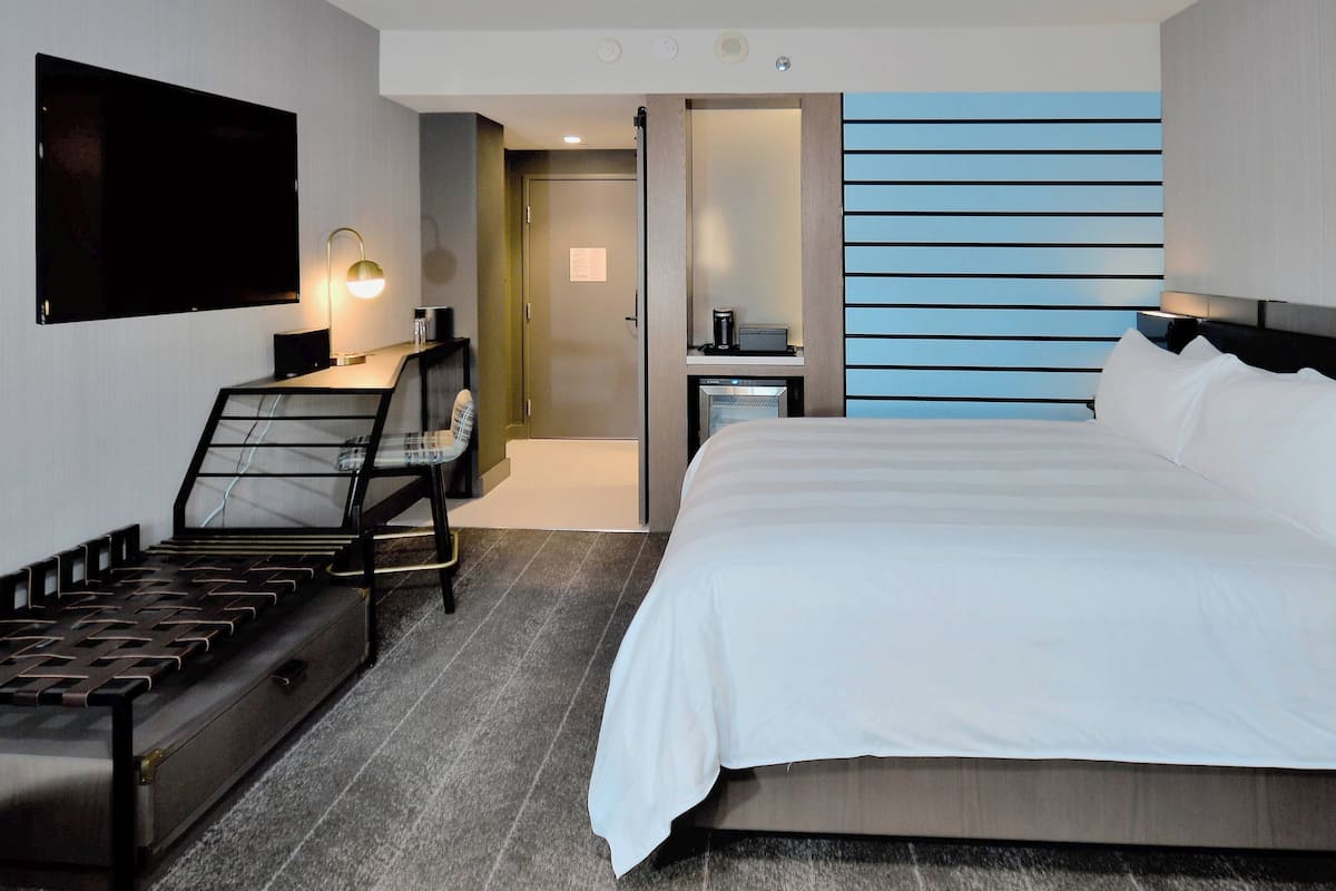 room, 1 king bed | 1 bedroom, down duvets, desk, blackout curtains