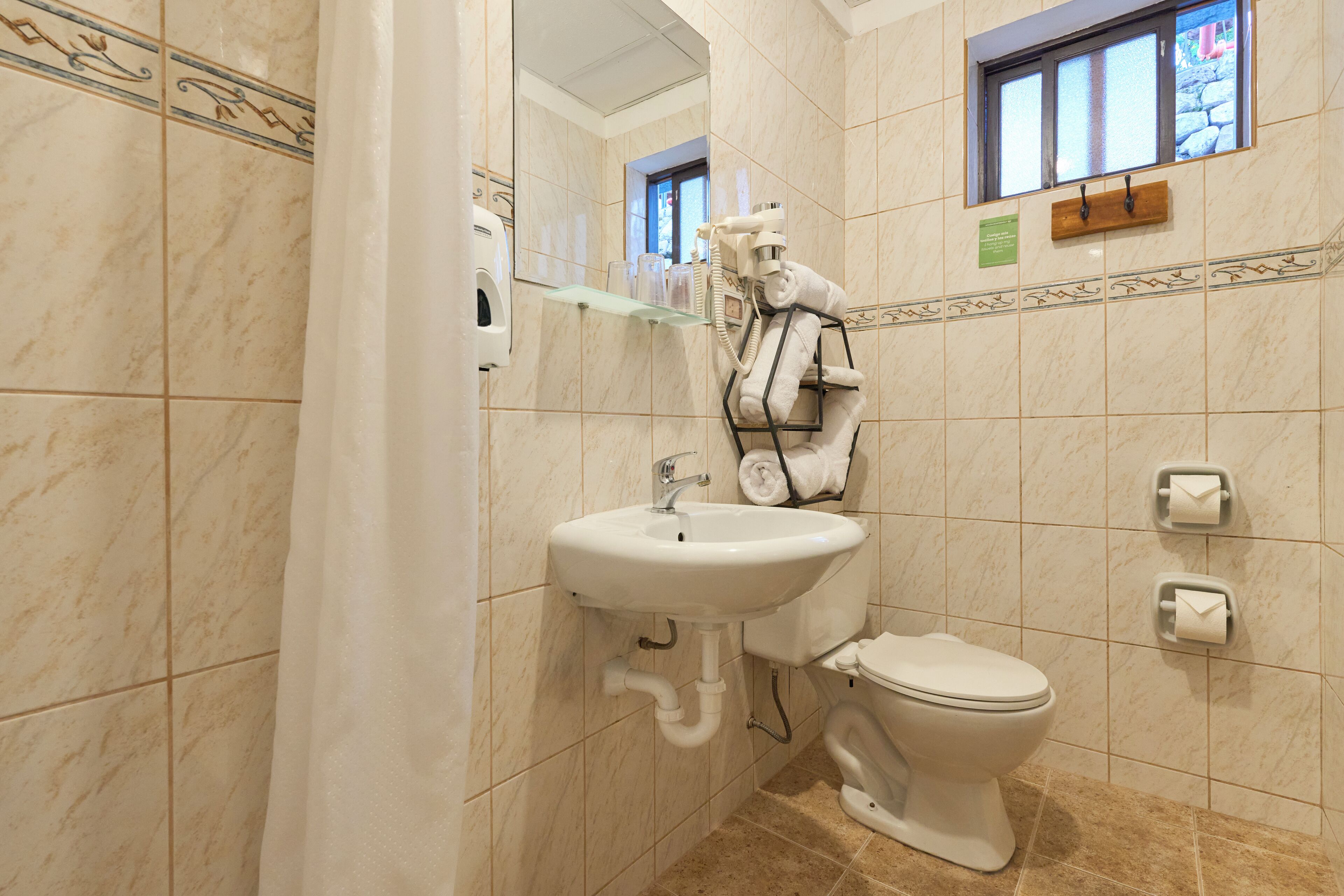 family quadruple room, multiple beds | bathroom | shower, hair dryer, towels, soap