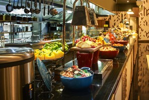 Breakfast, lunch, dinner served; local cuisine 