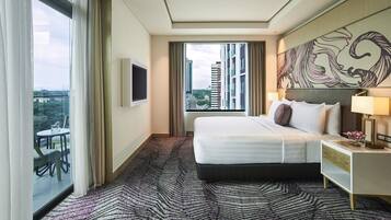 A hotel room with a large bed, a TV mounted on the wall, a window with curtains, and a view of the cityscape.