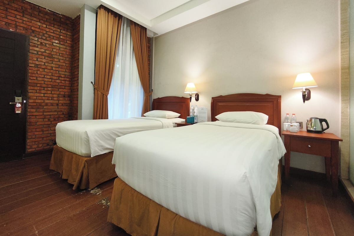 Cottage, 2 Single Beds | Bureau, accĂšs au Wi-Fi (inclus), literie fournie