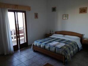 Double Room | Desk, blackout drapes, iron/ironing board, free cribs/infant beds