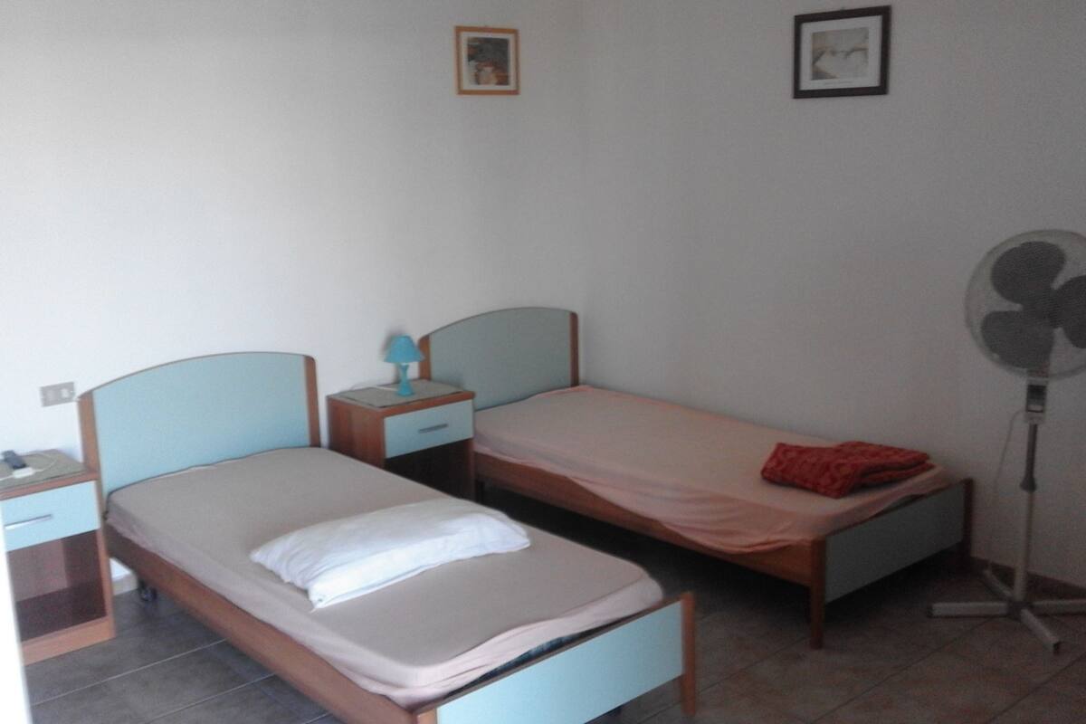 Twin Room, 2 Single Beds | Desk, blackout curtains, iron/ironing board (on request)