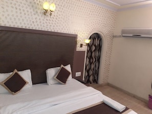 Premium bedding, minibar, desk, rollaway beds