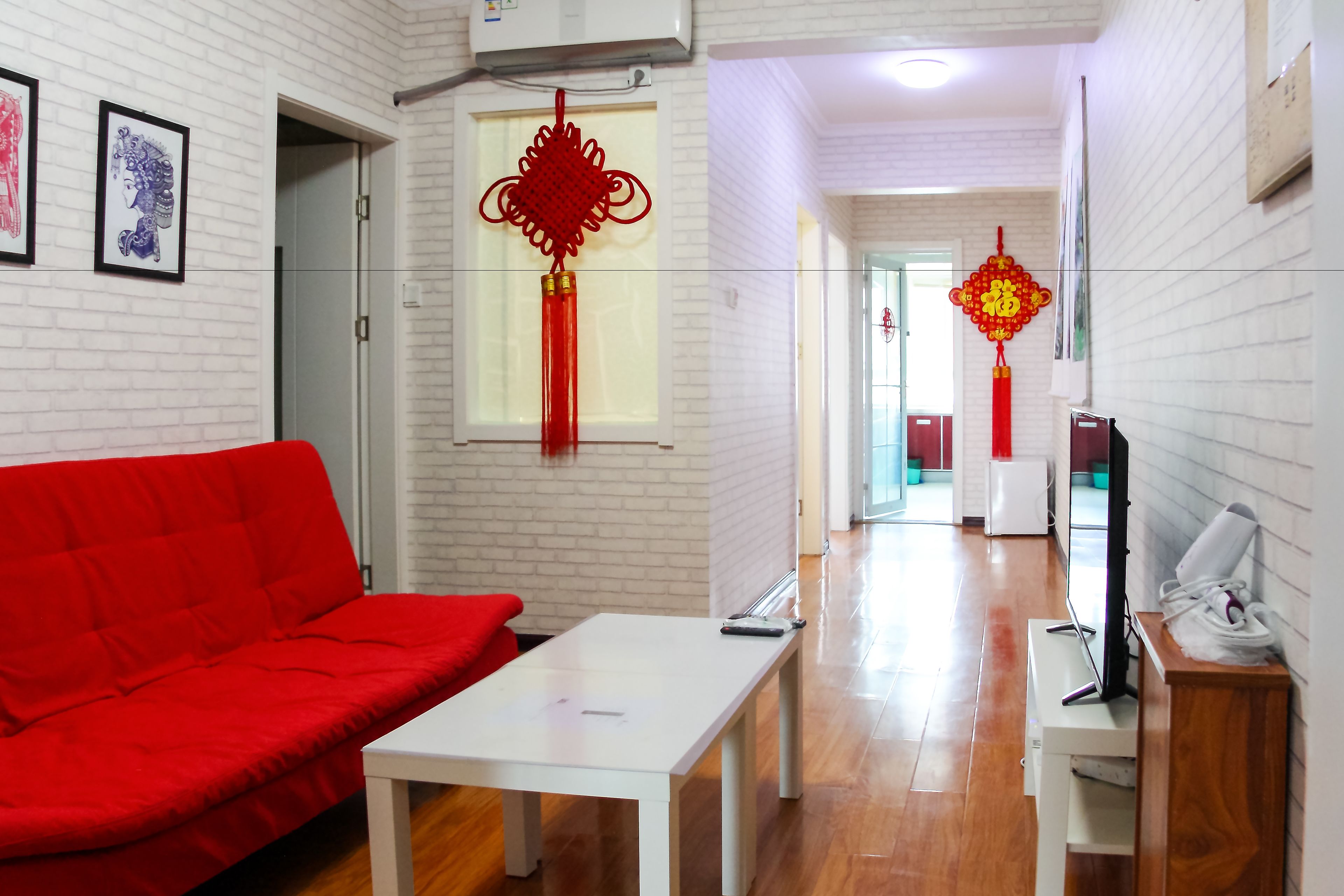 standard two-bedroom apartment | living area | flat-screen tv, pay films