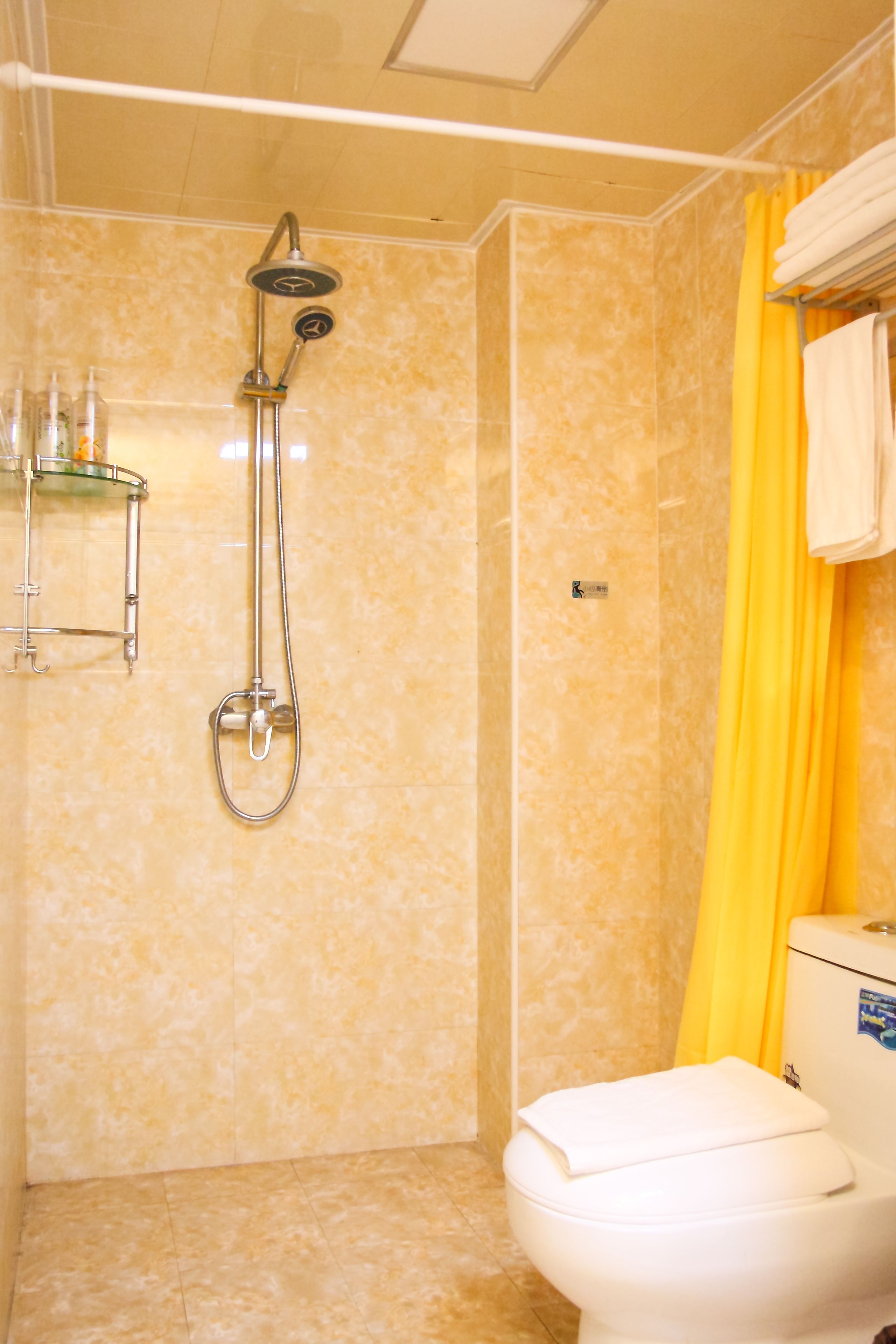 standard two-bedroom apartment | bathroom | shower, free toiletries, hair dryer, towels