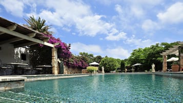 2 outdoor pools, open 9 AM to 10 PM, pool umbrellas, sun loungers