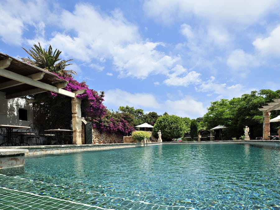 2 outdoor pools, open 9 AM to 10 PM, pool umbrellas, pool loungers