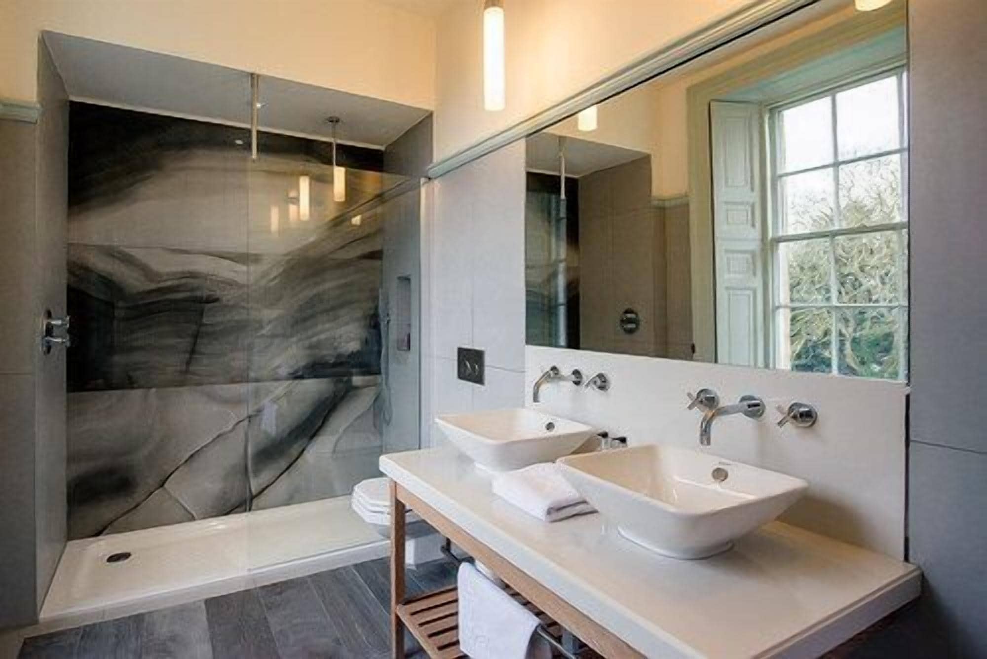Luxury Suite, 1 King Bed, River View | Bathroom | Shower, rainfall showerhead, designer toiletries, hair dryer