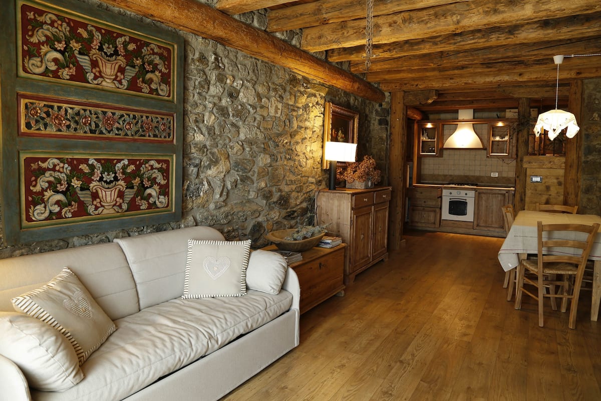 Nido del Picchio, for 8 people (Via Moneana di Clavais, 5 Ovaro) | Living area | Flat-screen TV