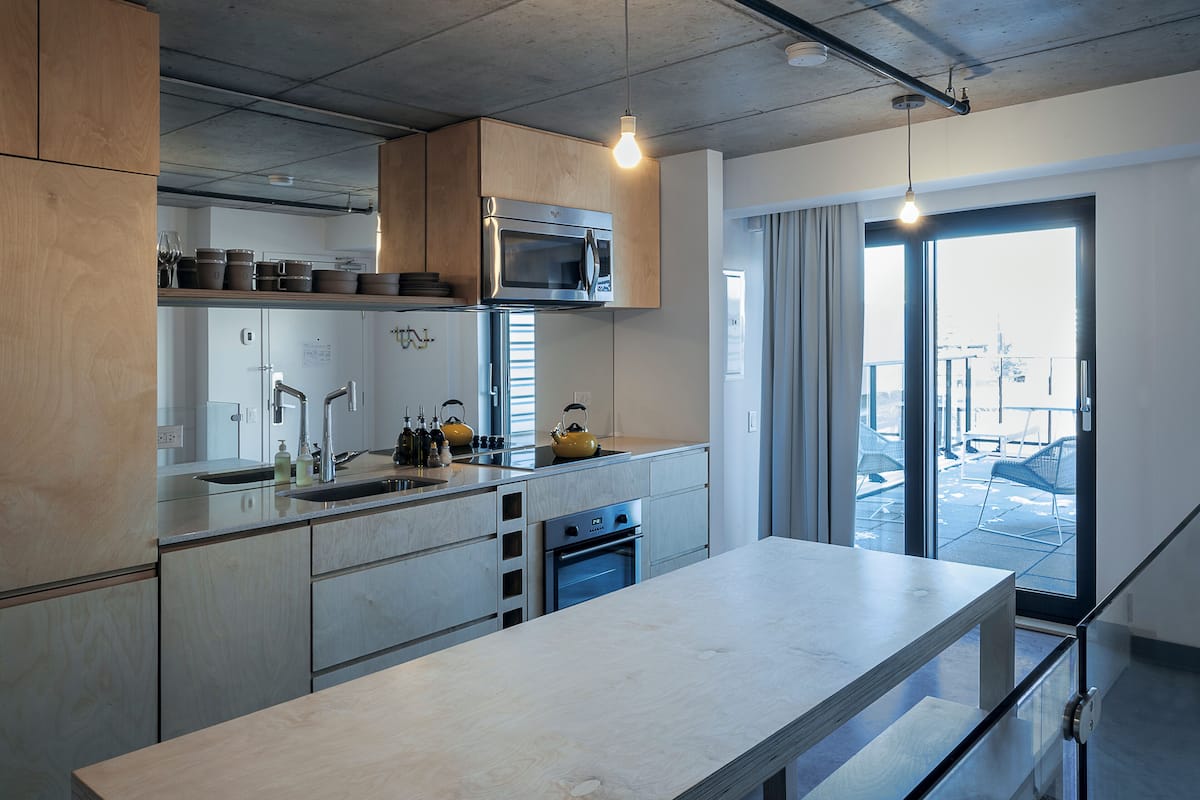 superior suite, 1 king bed, balcony | private kitchen | full-sized fridge, microwave, oven, stovetop