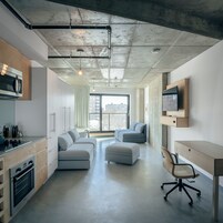 Deluxe Double Room, 1 King Bed, Bathtub | Living area | 49-inch LED TV with cable channels, TV, heated floors