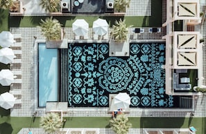 2 outdoor pools, open 8:00 AM to 8:00 PM, pool cabanas (surcharge)