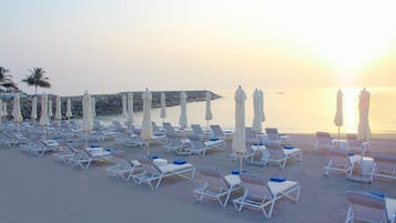 Private beach, sun loungers, beach umbrellas, beach towels