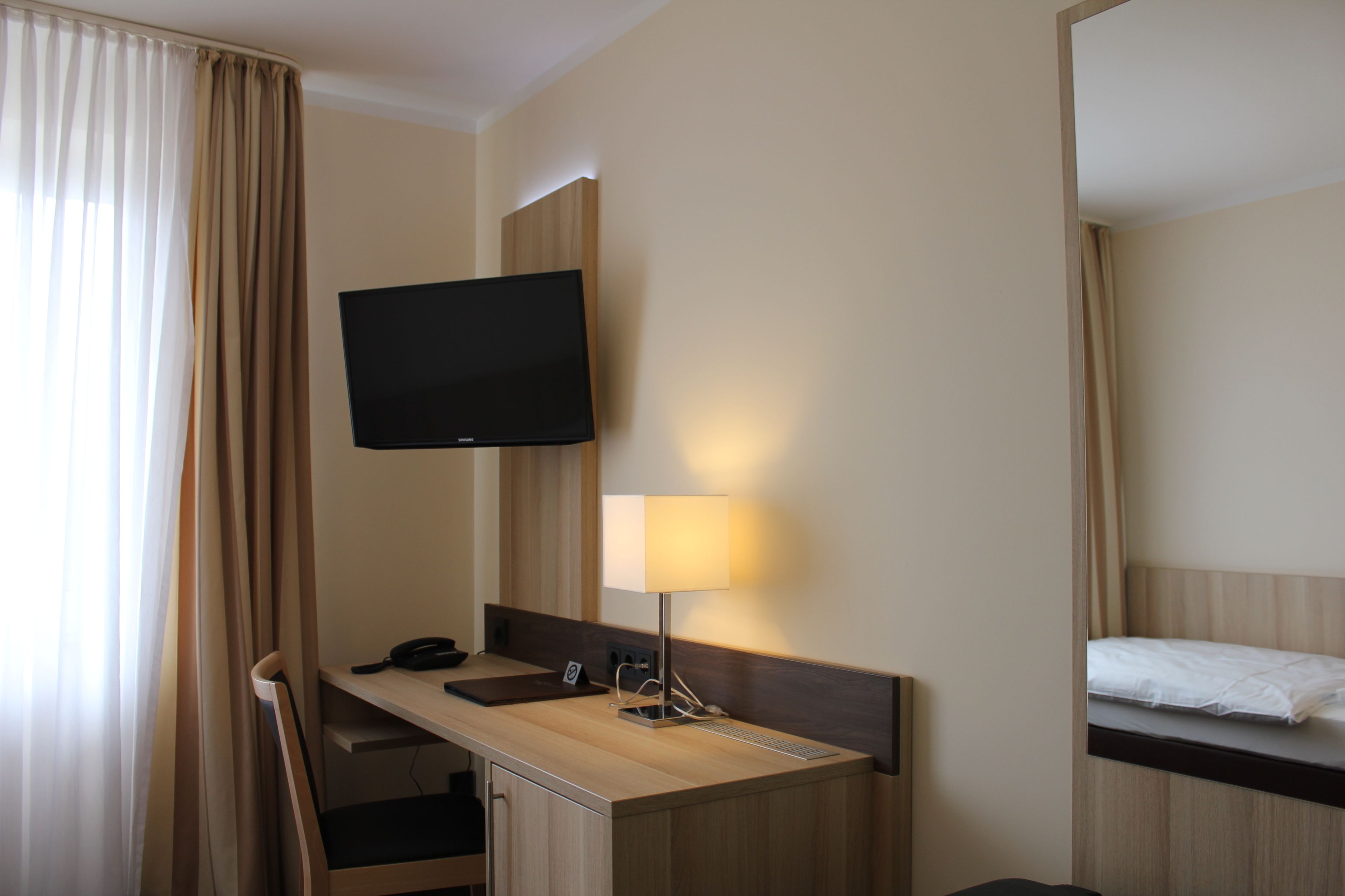 single room | desk, laptop workspace, blackout curtains, iron/ironing board