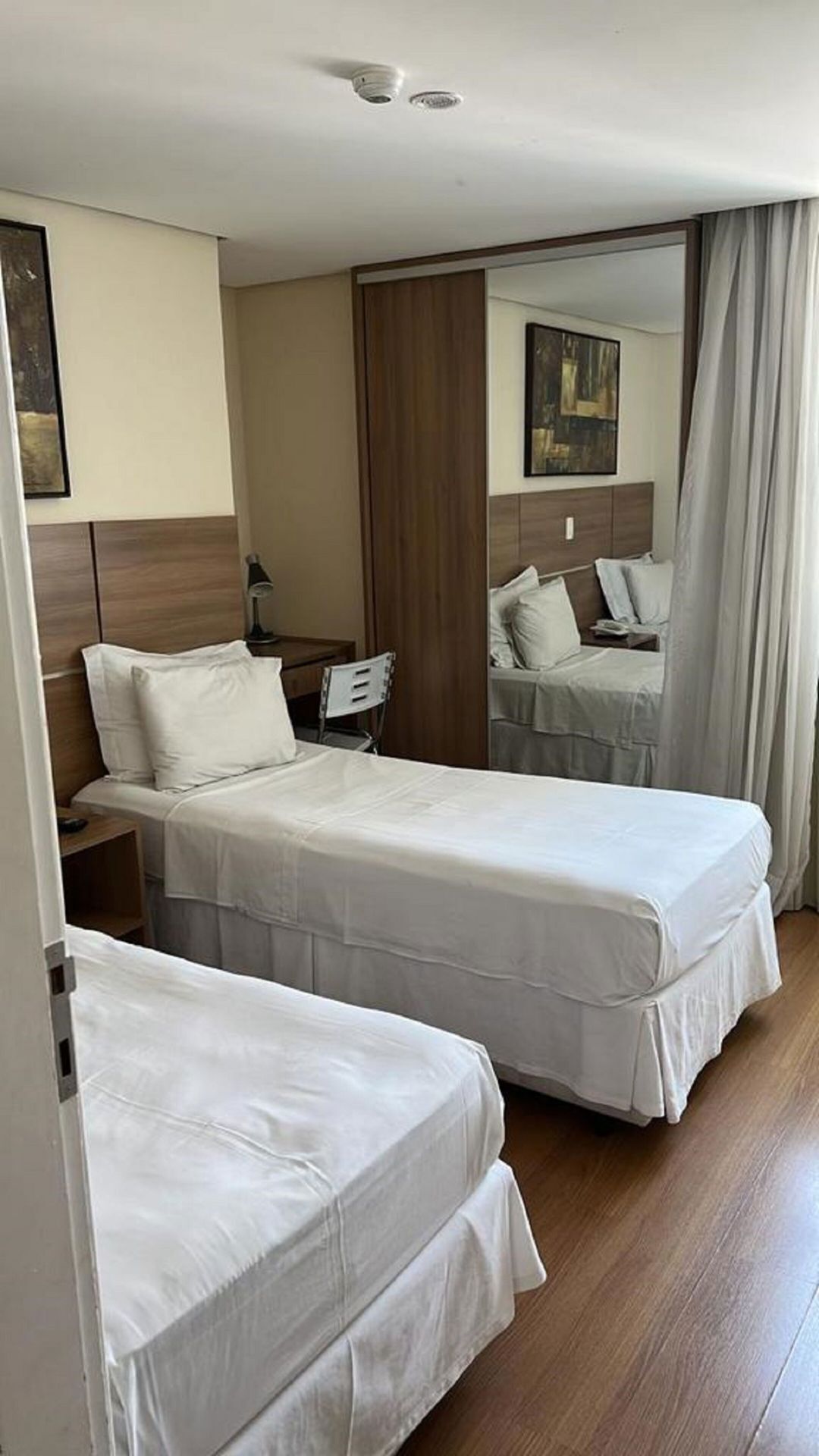 Laptop workspace, blackout curtains, soundproofing, free WiFi