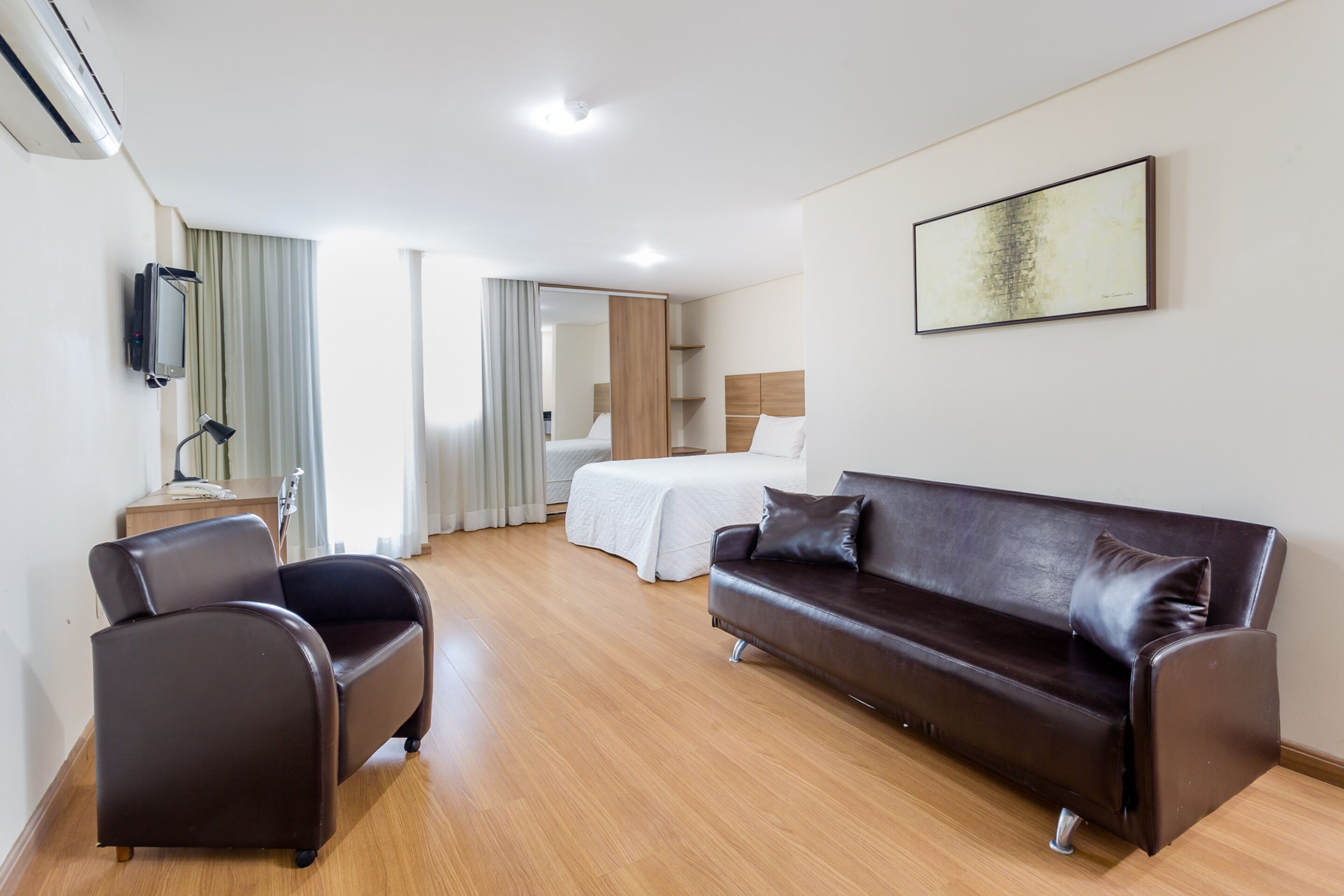 Laptop workspace, blackout curtains, soundproofing, free WiFi