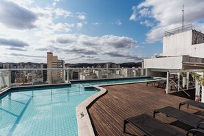 Outdoor pool, pool umbrellas, pool loungers