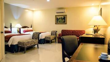 Desk, iron/ironing board, bed sheets