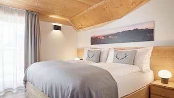 Premium bedding, down duvets, pillow-top beds, in-room safe