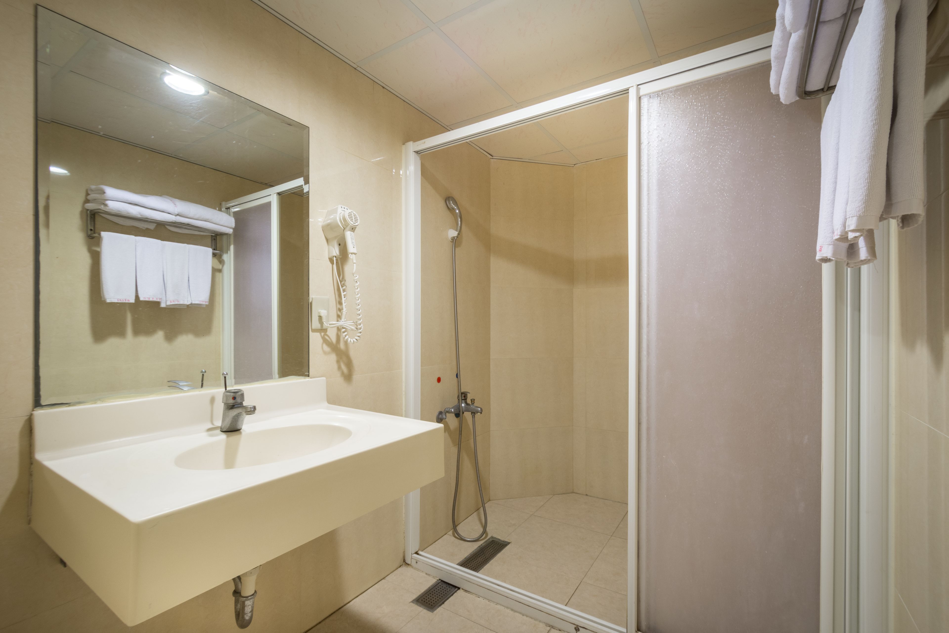 quadruple room | bathroom | shower, hair dryer, slippers, towels