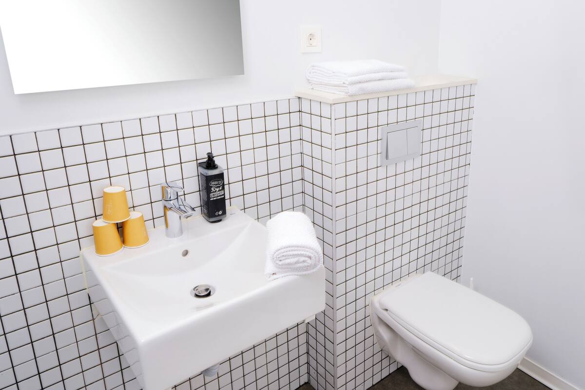 triple room, multiple beds | bathroom | shower, eco-friendly toiletries, towels, toilet paper