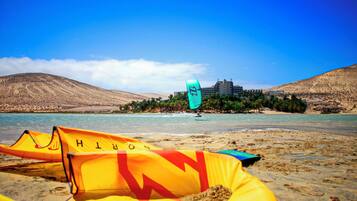 On the beach, white sand, windsurfing