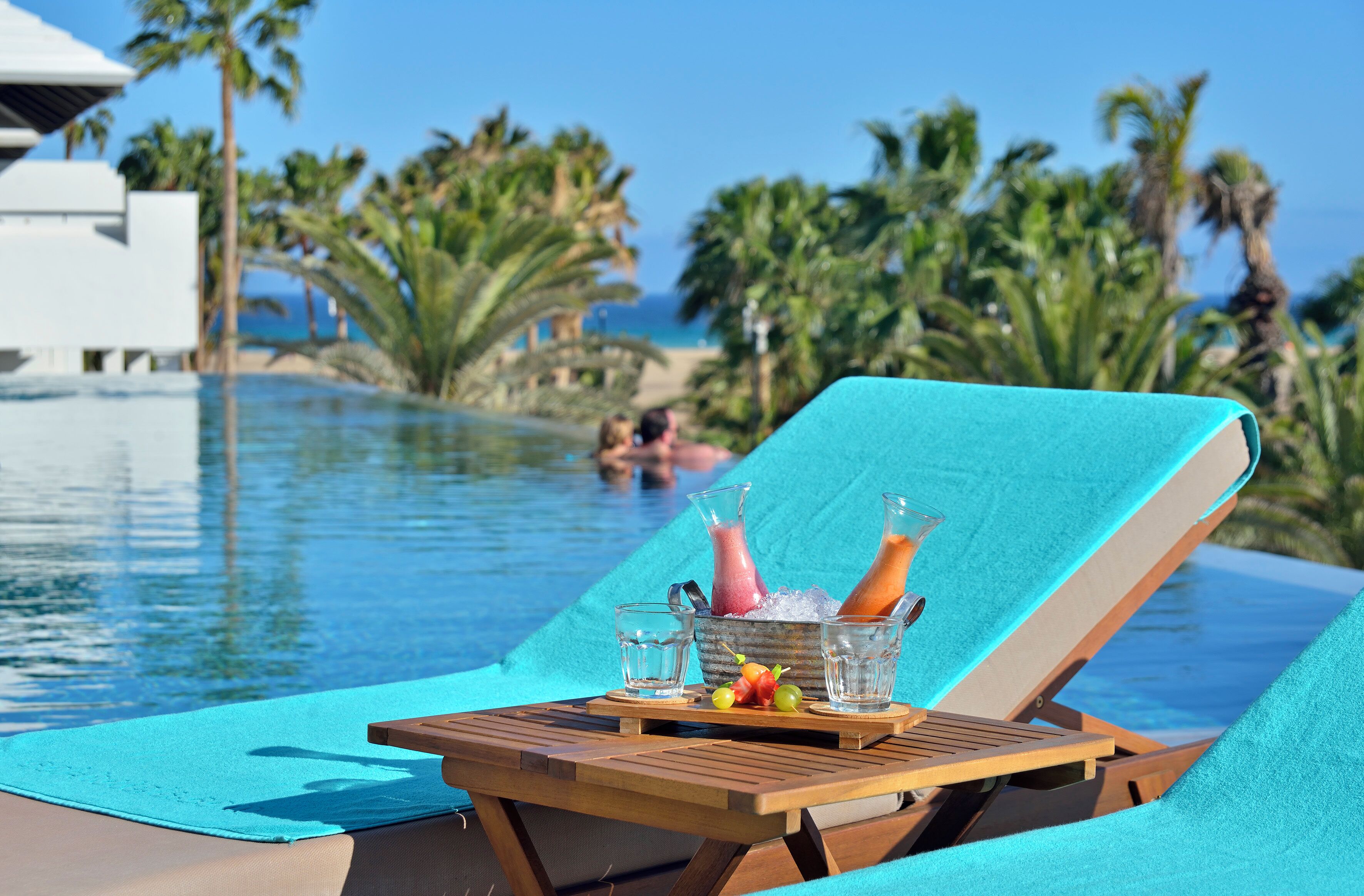 Outdoor pool, pool umbrellas, pool loungers