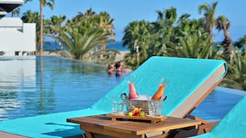 Outdoor pool, pool umbrellas, pool loungers