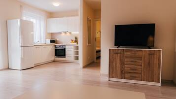 Apartment, 1 Bedroom, Terrace (Number 4) | Living area | 40-inch flat-screen TV with cable channels, LCD TV