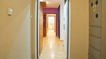 Deluxe Apartment, 3 Bedrooms | Living area | Flat-screen TV