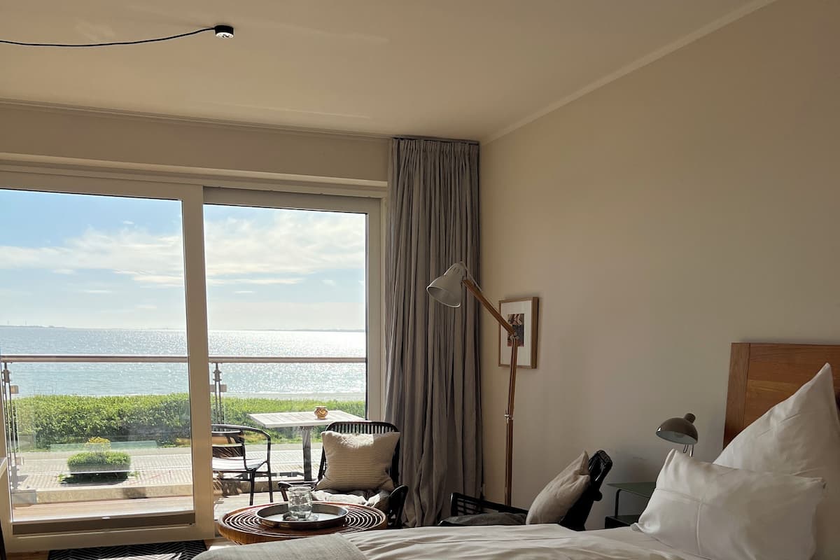 Deluxe Double Room, Balcony, Sea View | Minibar, blackout drapes, iron/ironing board, free cribs/infant beds