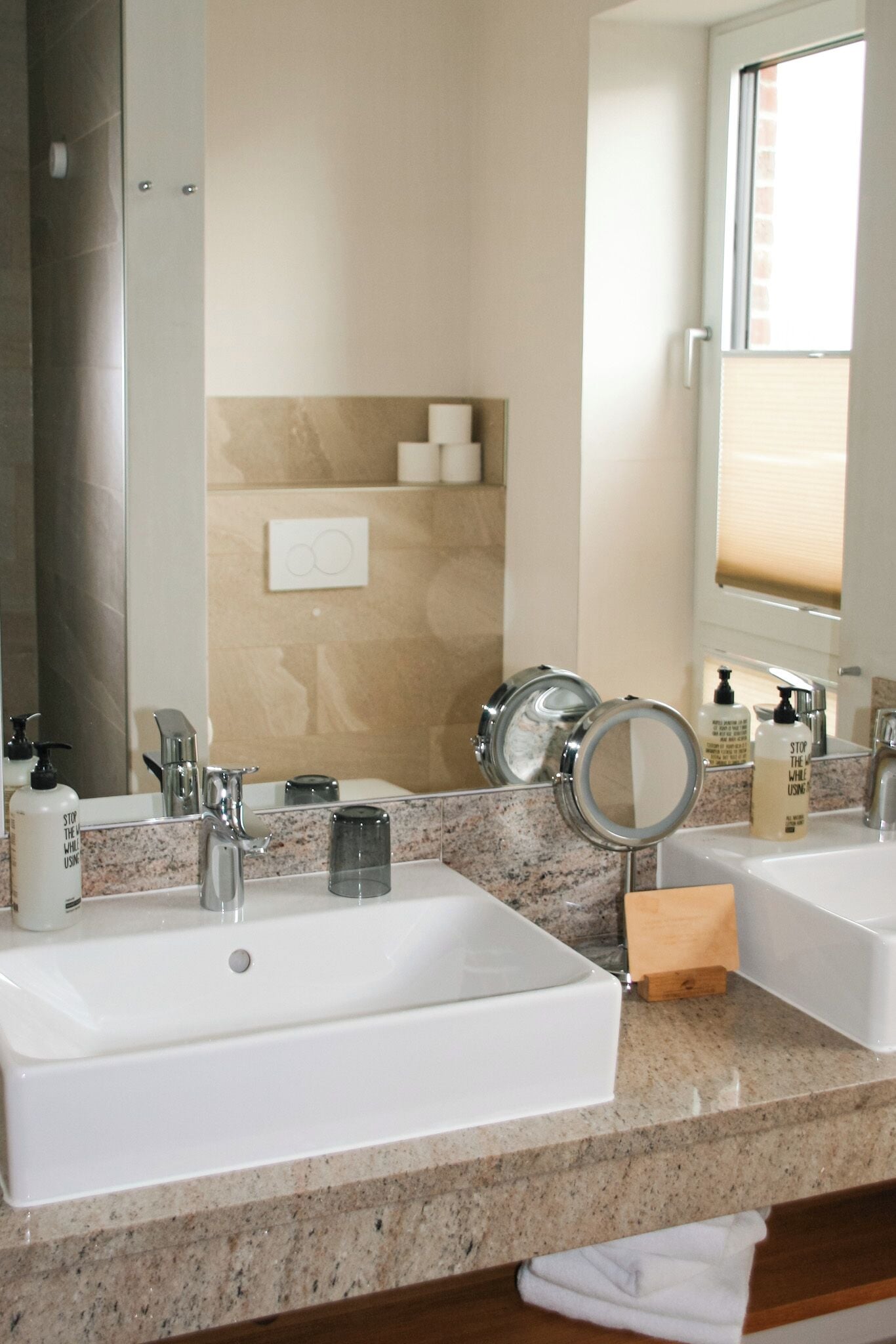 deluxe suite | bathroom | hair dryer, towels