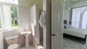 Three Bedroom Villa | Bathroom | Shower, hair dryer, towels