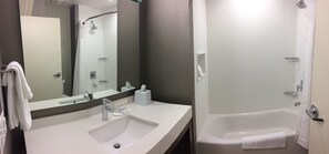 Designer toiletries, hair dryer, towels