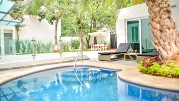 Outdoor pool, open 8:00 AM to 10:00 PM, pool umbrellas, pool loungers