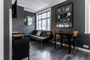 Premium bedding, desk, laptop workspace, blackout curtains