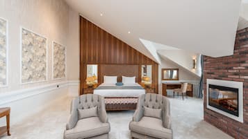 Suite, 1 King Bed, Non Smoking | Living area | 40-inch LED TV with satellite channels, TV, toys