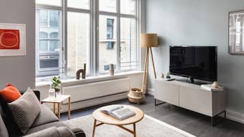 Premium 2 Bedroom Apartment | Living area | 43-inch Smart TV with cable channels