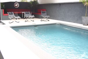 Outdoor pool, sun loungers