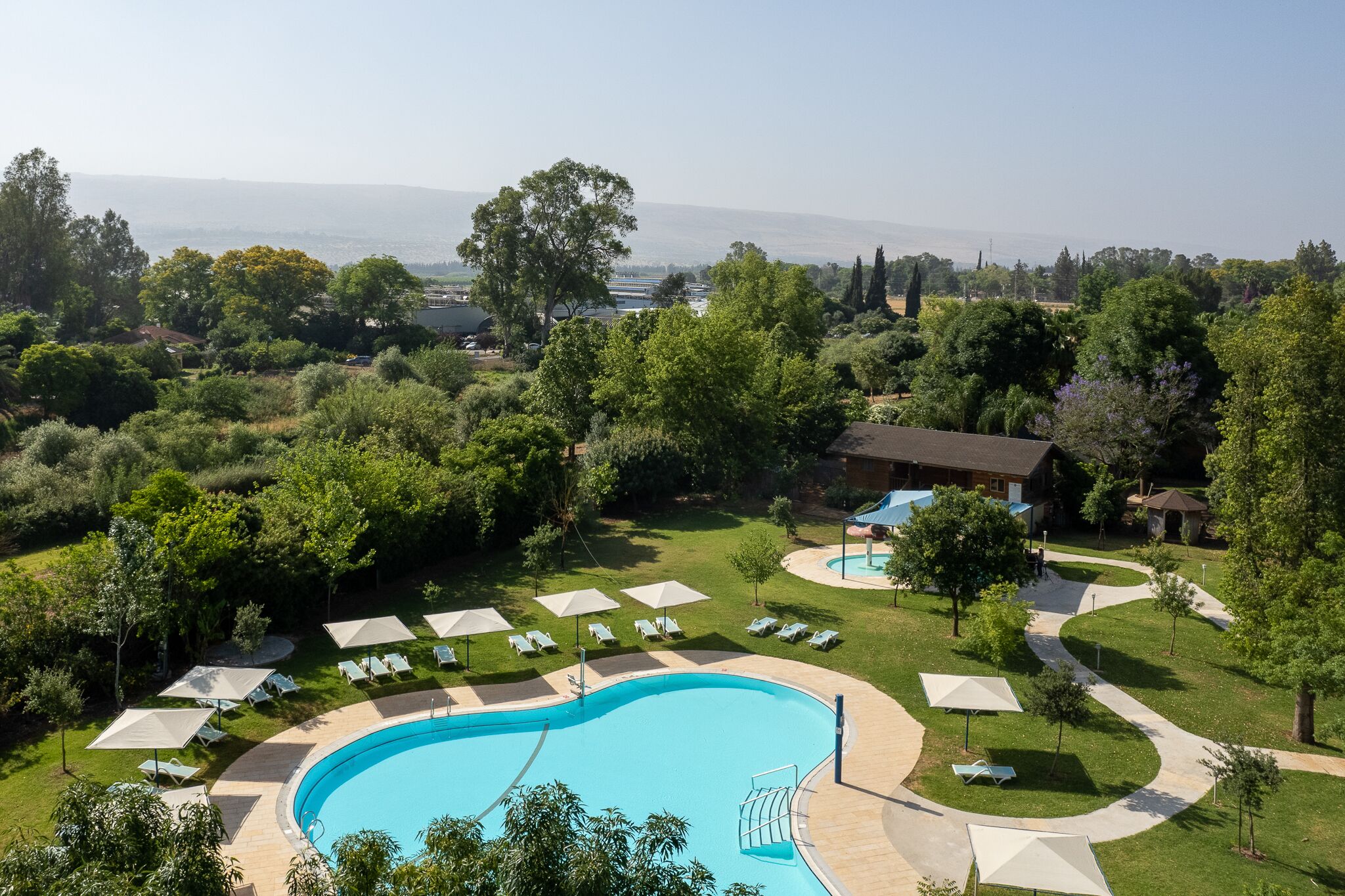 Seasonal outdoor pool, open 10:00 AM to 6:00 PM, sun loungers