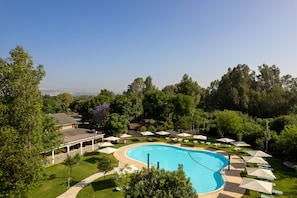 Seasonal outdoor pool, open 10:00 AM to 6:00 PM, sun loungers - The Village – Jordan Riverside TravelHotel (HaGalil HaElyon)
