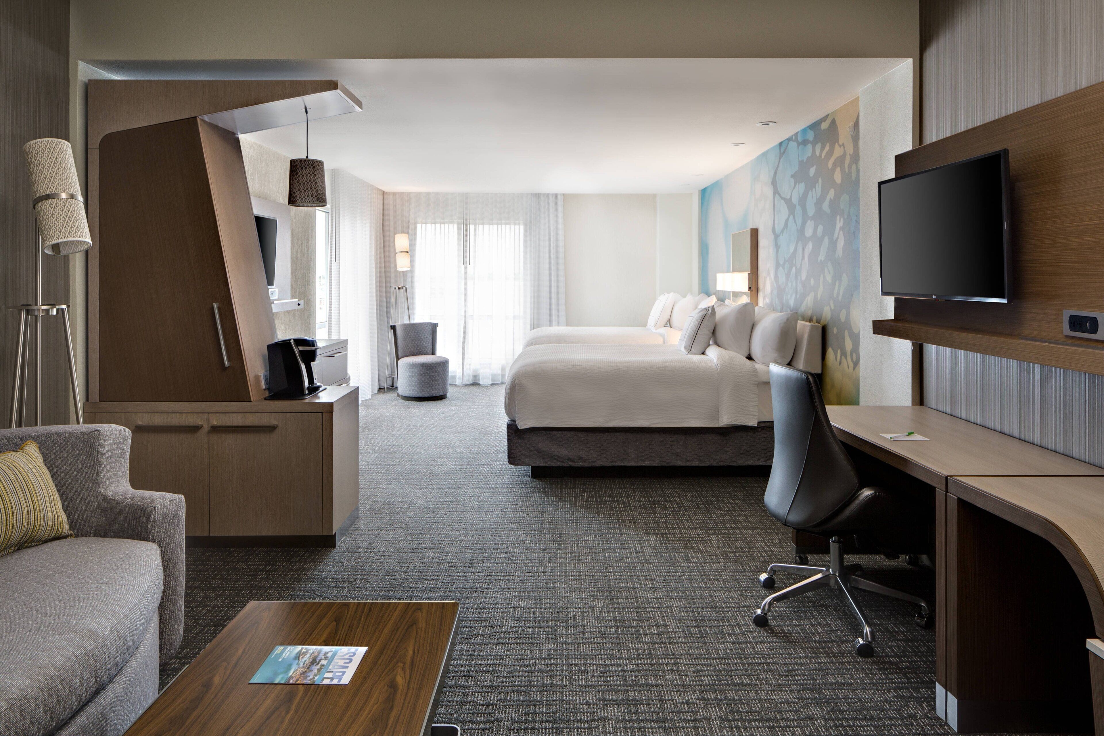 Suite, Multiple Beds | In-room safe, desk, iron/ironing board, free cribs/infant beds
