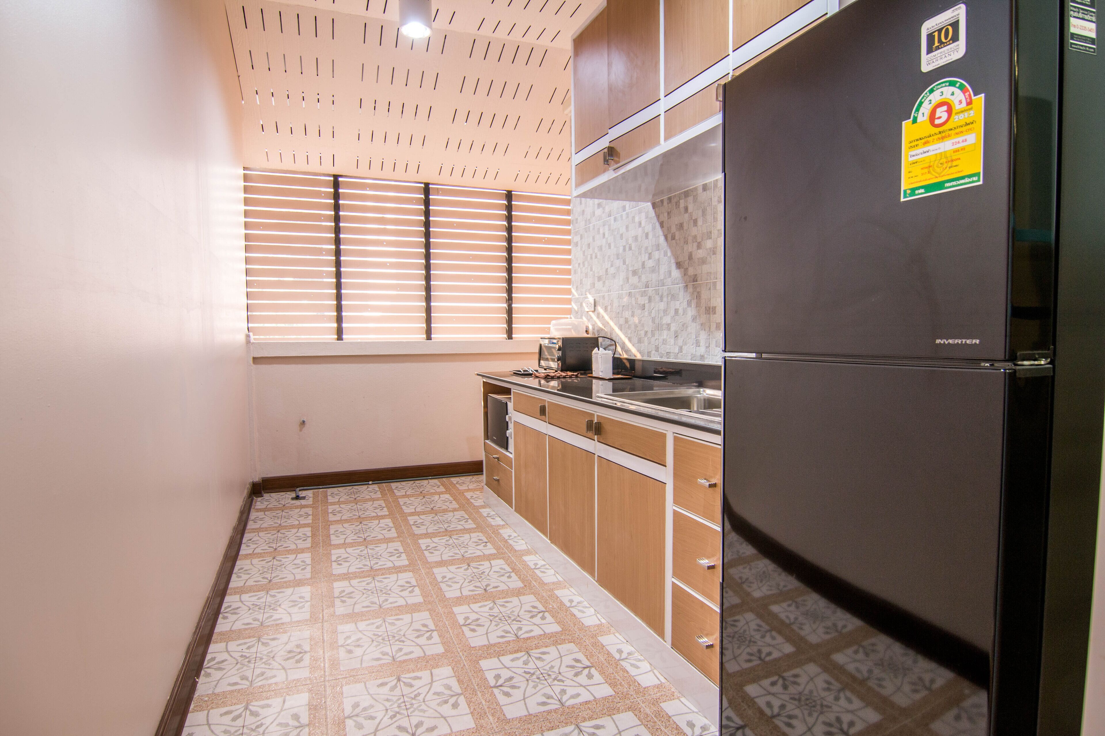 cozy suite with kitchenette | in-room safe, desk, free wifi, bed sheets