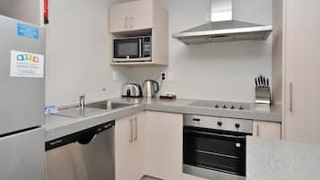 Apartment, 2 Bedrooms | Private kitchen | Full-size fridge, microwave, oven, stovetop